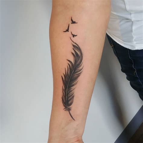 feather and bird tattoo meaning